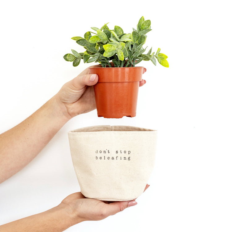 plant pot cover with don't stop beleafing stamped